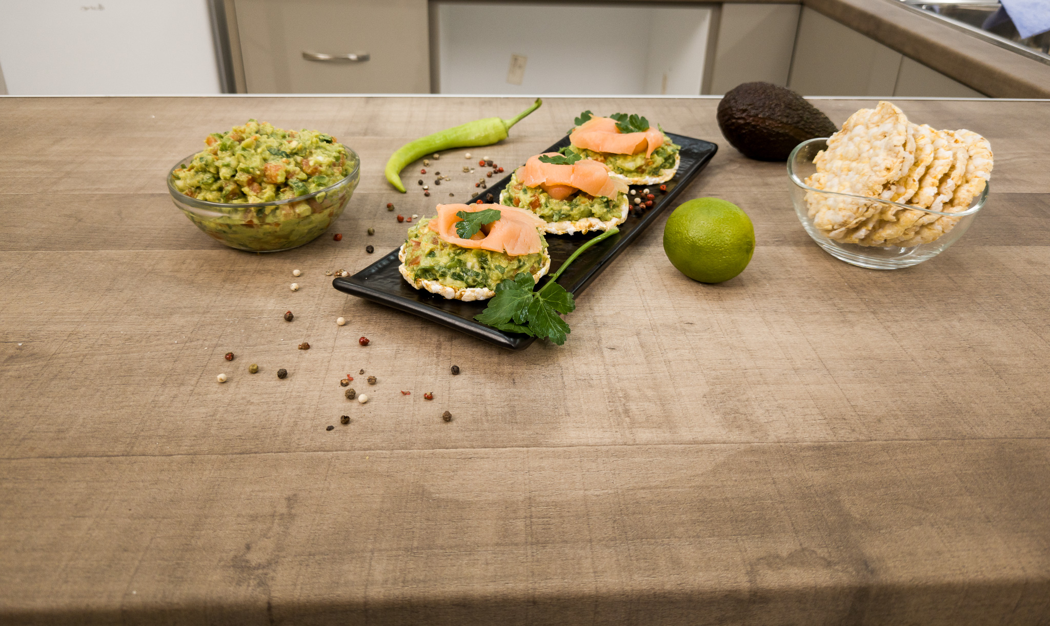Guacamole with Smoked Salmon on Rice Cakes
